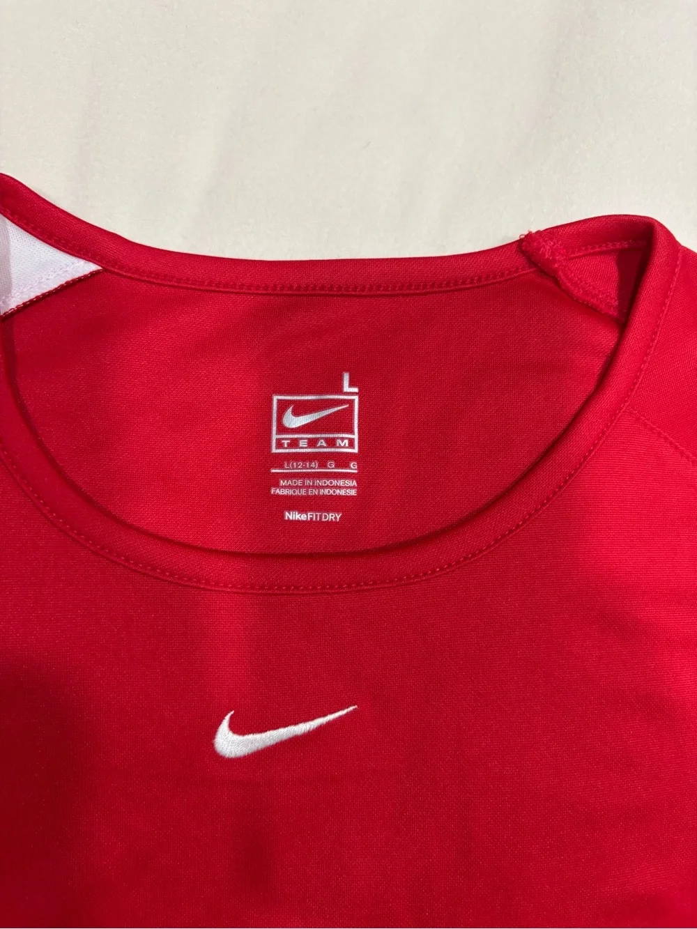 Nike women’s Red Athletic Crew Tee with White Sleeve Detail